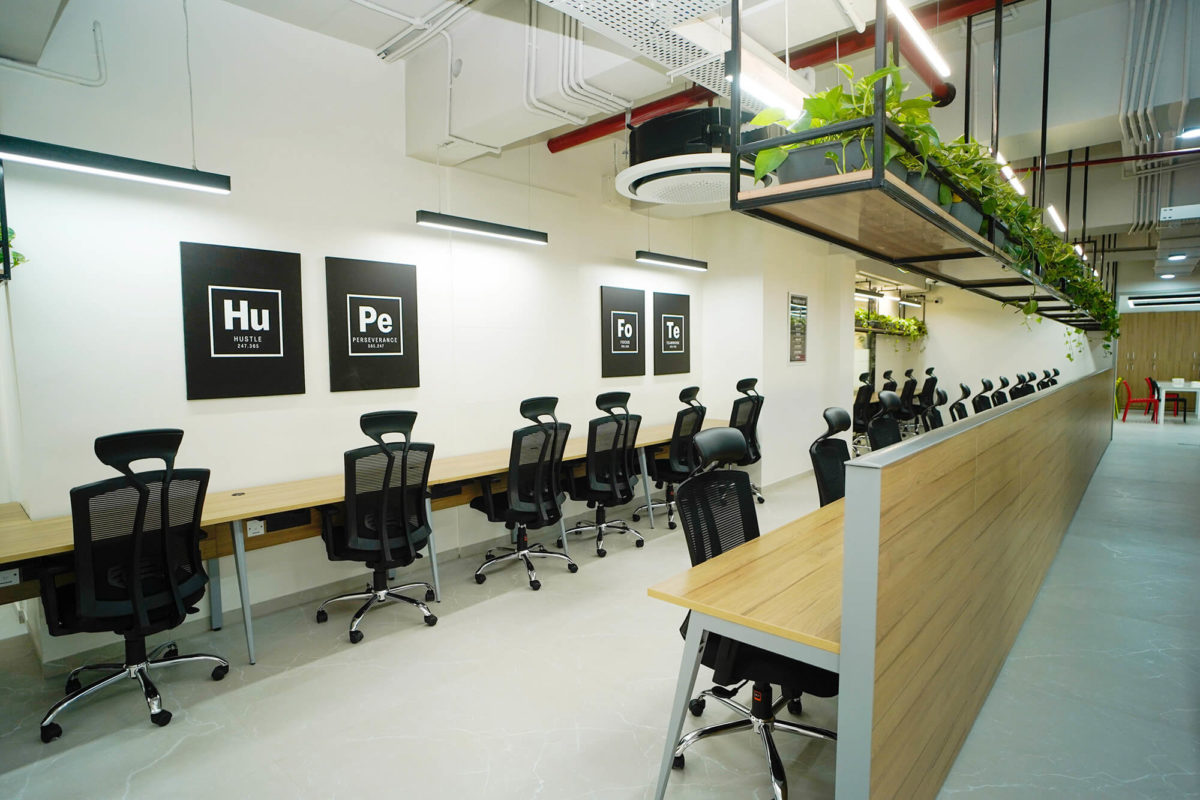 Digital Print of Hu, Pe, Fo, Te on the wall of the office corner