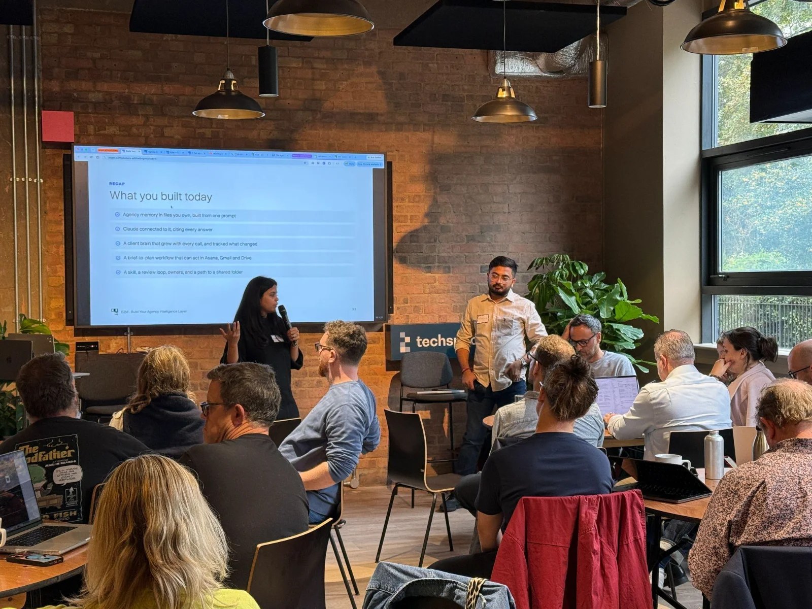 Attendees working together at E2M's London AI intelligence layer workshop