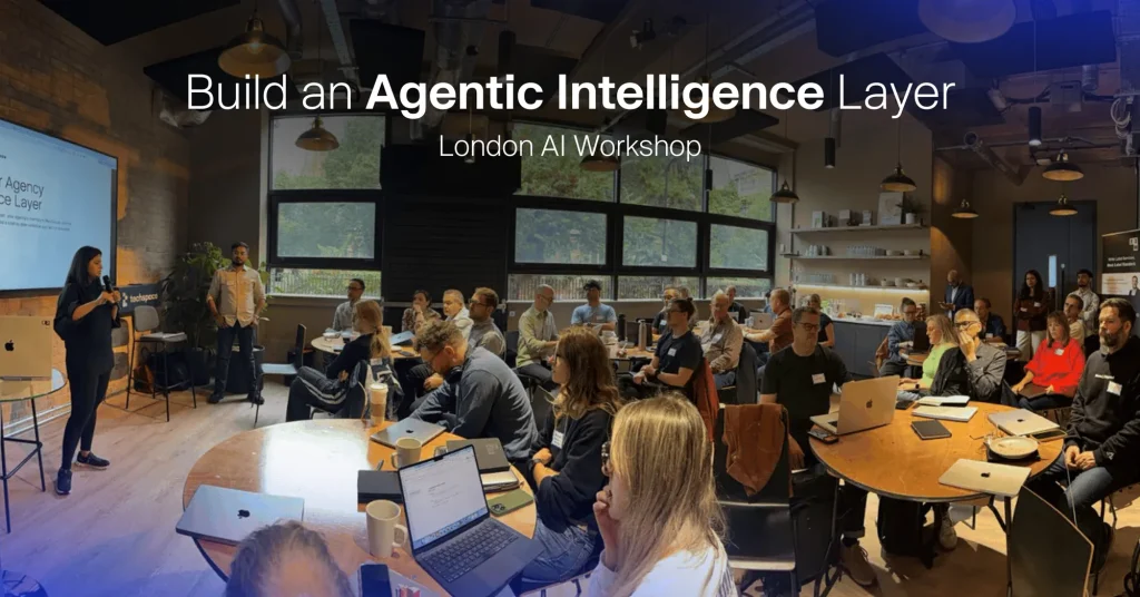 Agency owners at E2M's London AI workshop building an agentic intelligence layer for their agencies on laptops