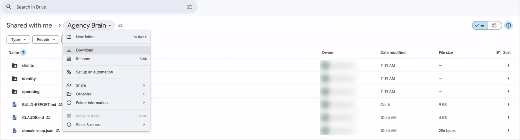Agency Brain folder shared on Google Drive with client, identity and operating folders and the CLAUDE.md router