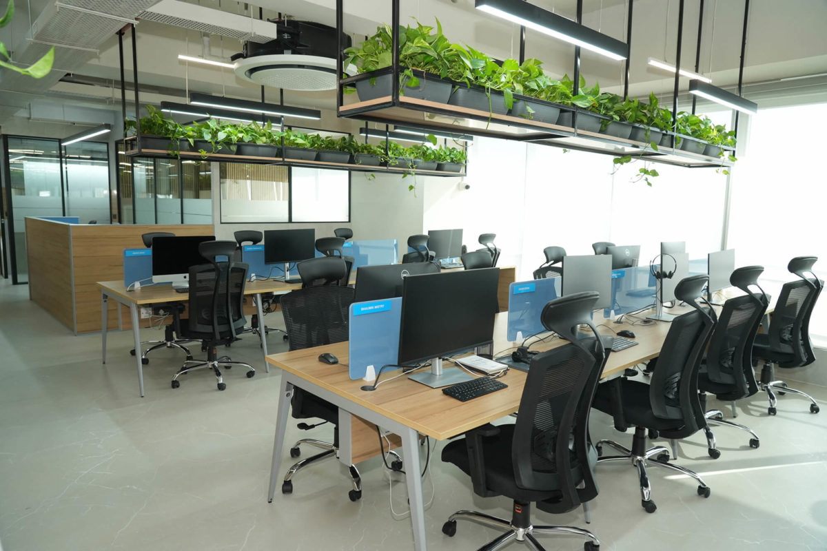 Open Floor Workstation Desks in the Corner with a road view
